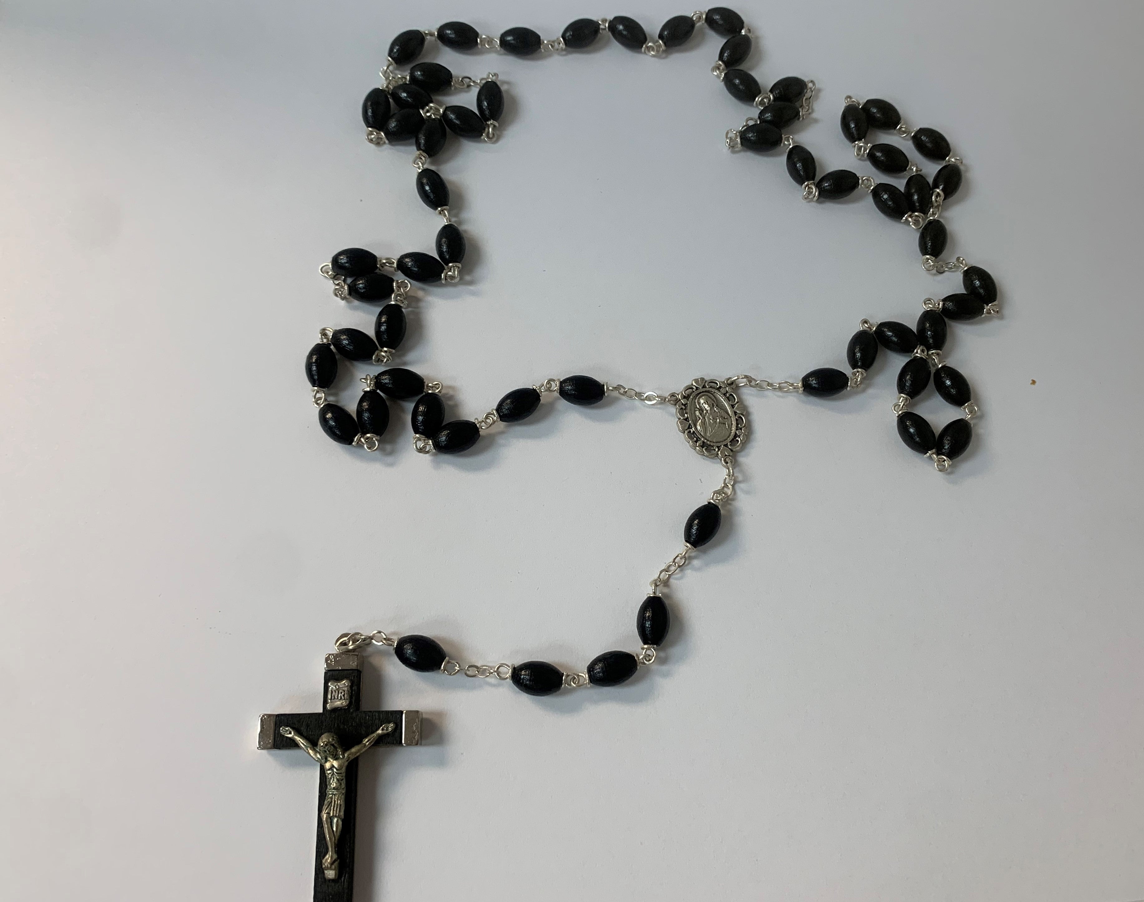 Rotario de madera con centro del Sagrado Corazón de Jesús